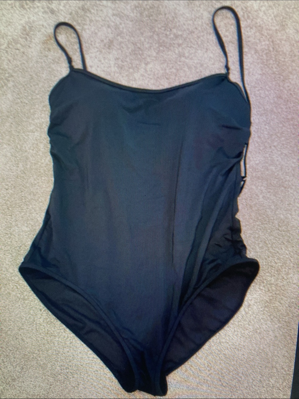 Sleek Black One-Piece Swimsuit with Slim Straps